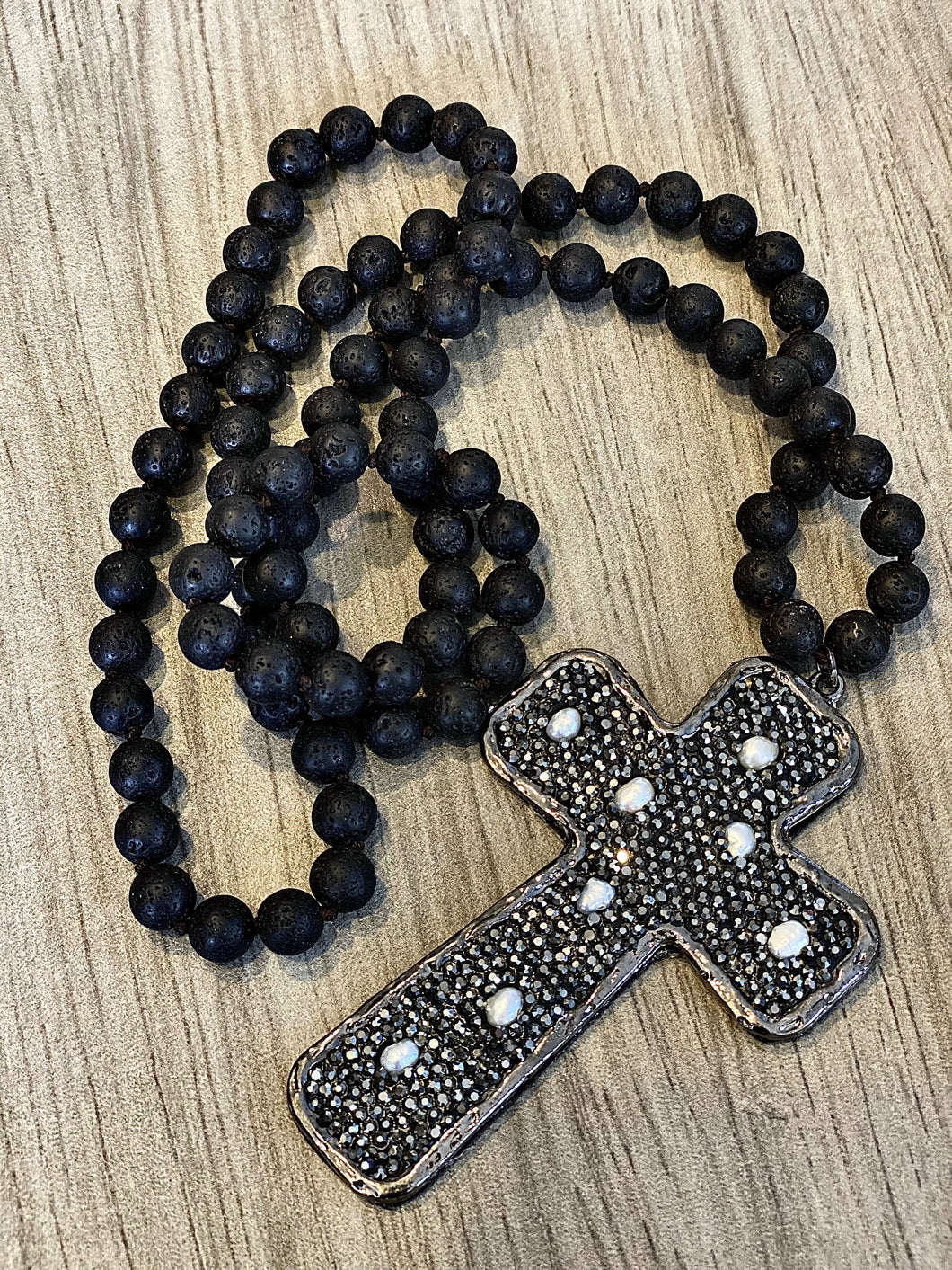 Black beaded tribal cross necklace