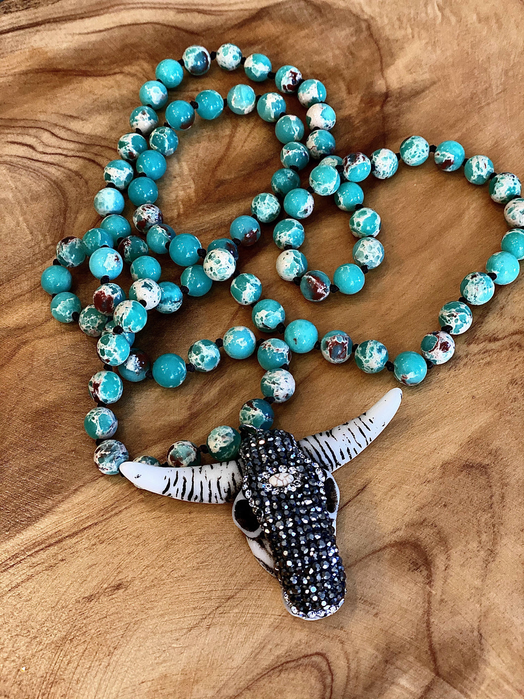 Turquoise beaded ox head pendant necklace